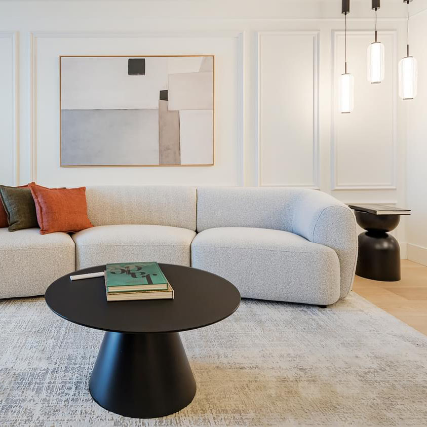 Living Room with boiserie and black sidetable